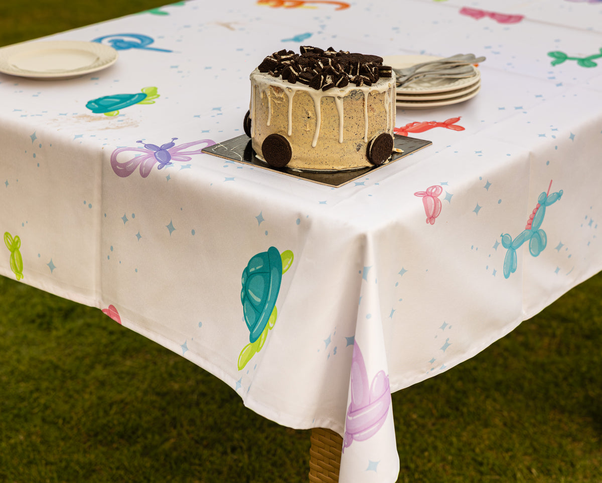 The Happy twisting balloons table cover